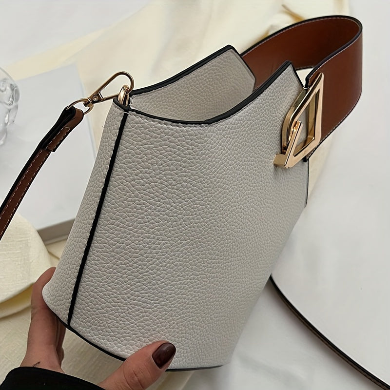 Bolsa Bucket Feminina; Bolsa Marrom Elegante; Bolsa com Alça Larga; Bolsa Estruturada Feminina; Bolsa Tendência Outono; Bolsa de Ombro Fashion; Bolsa com Detalhe Dourado; Bolsa Casual Chique
