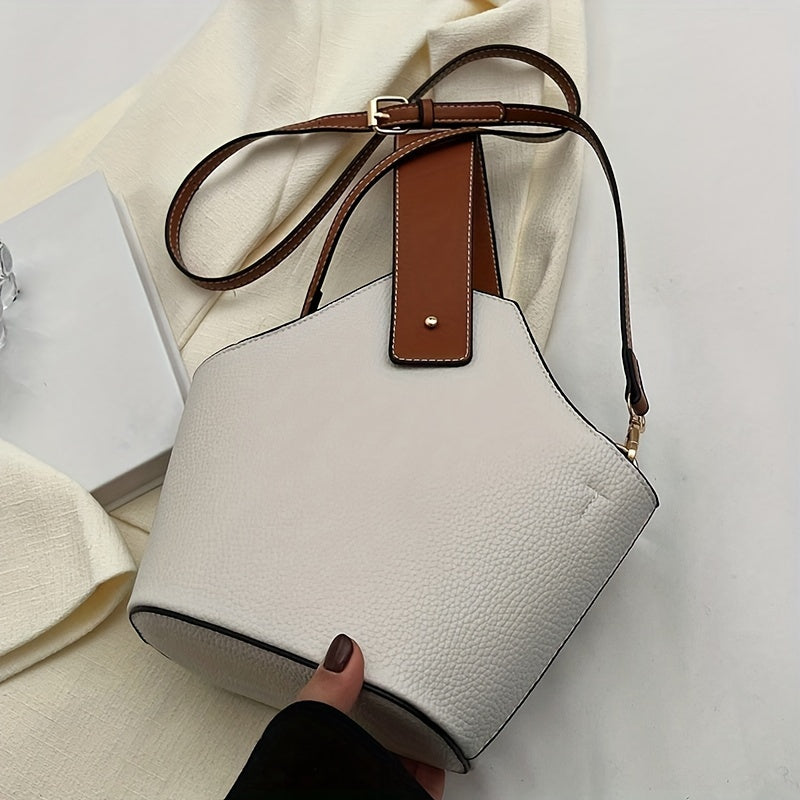 Bolsa Bucket Feminina; Bolsa Marrom Elegante; Bolsa com Alça Larga; Bolsa Estruturada Feminina; Bolsa Tendência Outono; Bolsa de Ombro Fashion; Bolsa com Detalhe Dourado; Bolsa Casual Chique; Bolsa com Textura Croco; Bolsa Versátil Feminina